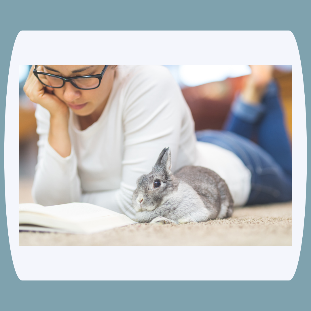 young woman reading to bunny
